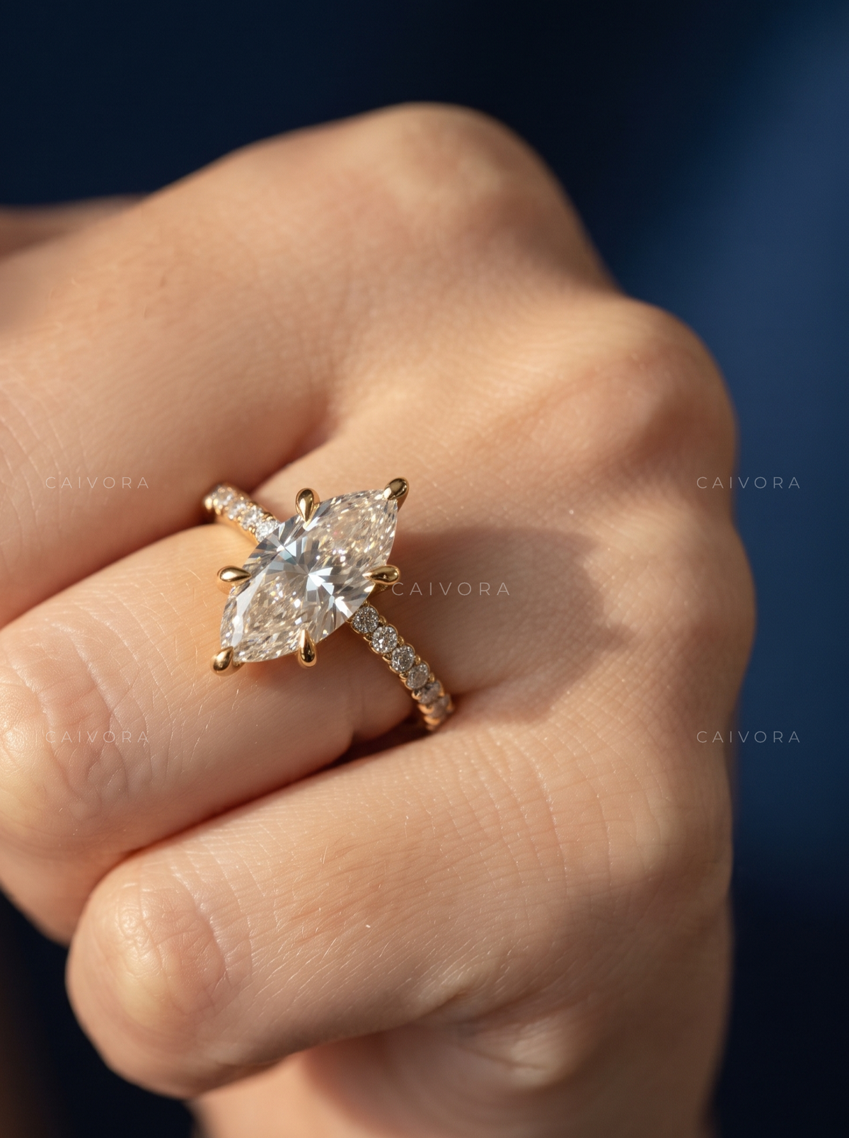 Marquise Cut Diamond Engagement Ring with Tapered Pave Band
