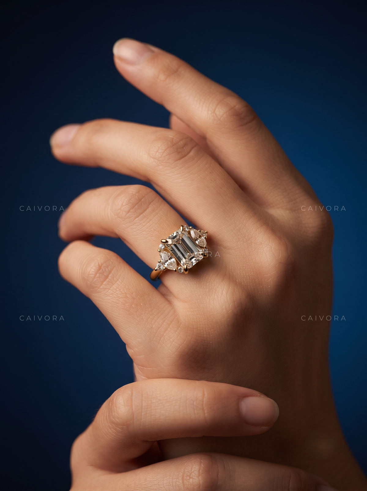 Emerald Cut Diamond Elongated Engagement Ring with Claw Prongs