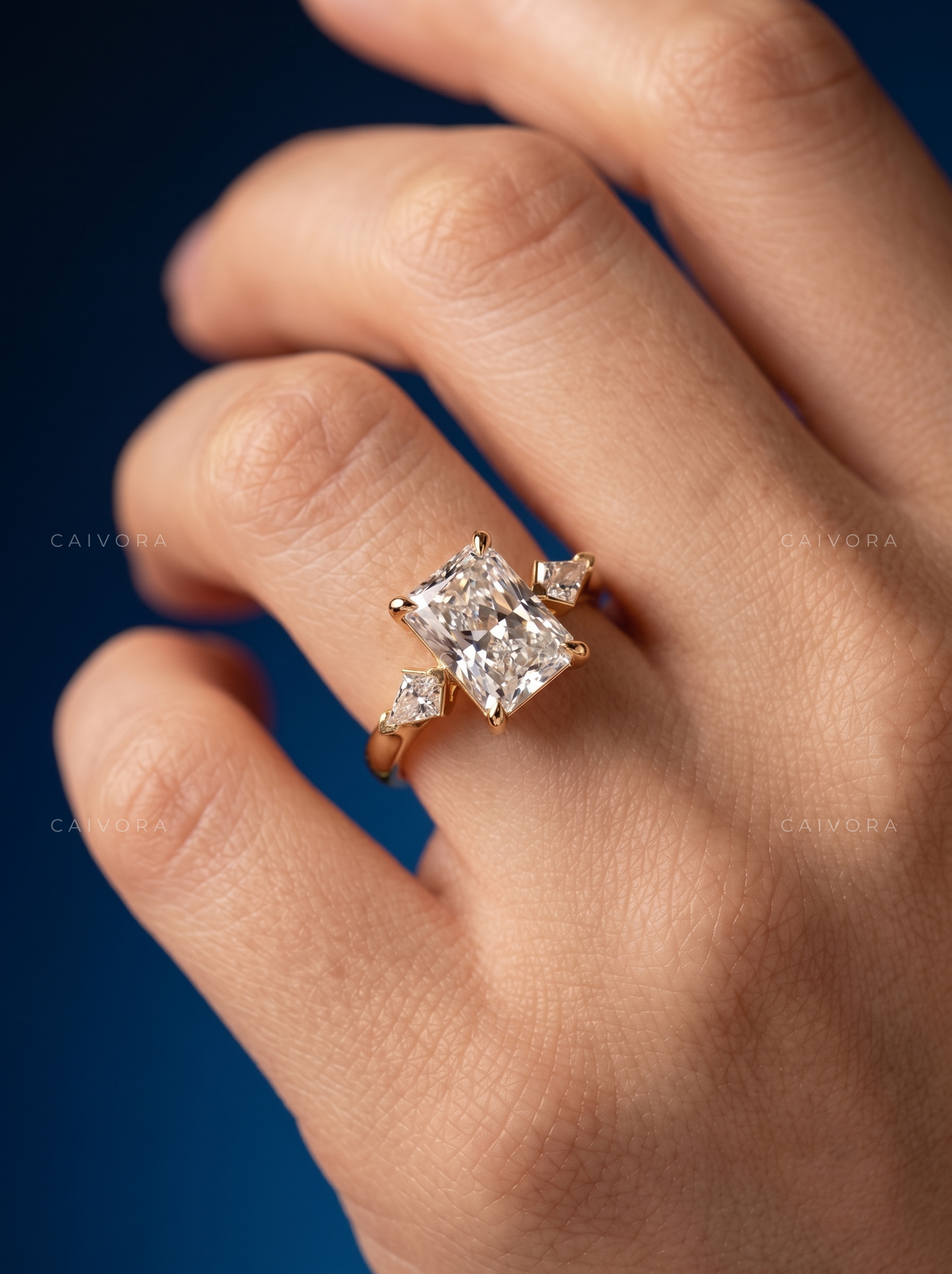 Modern Three Stone Engagement Ring with Radiant Diamond & Kite Accents