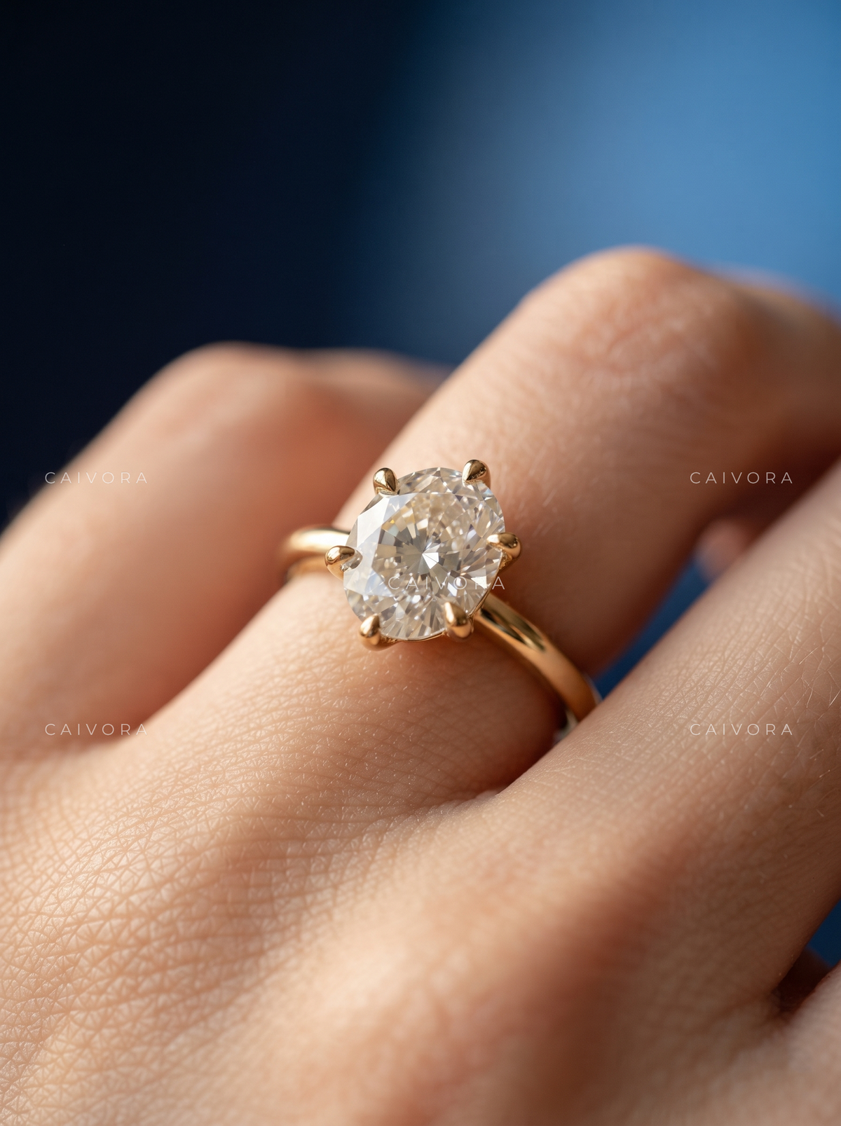 Classic Tapered Cathedral Engagement Ring Centered on a Round Cut Diamond