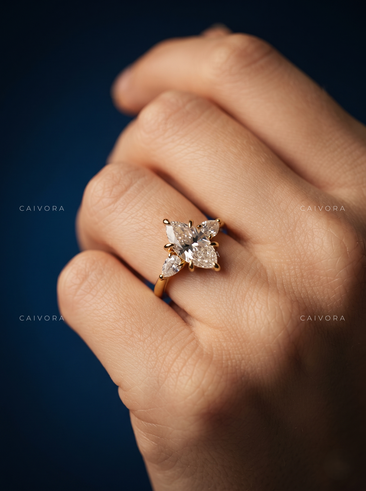 Elegant Three Stone Engagement Ring Centered on a dutch marquise Cut Diamond