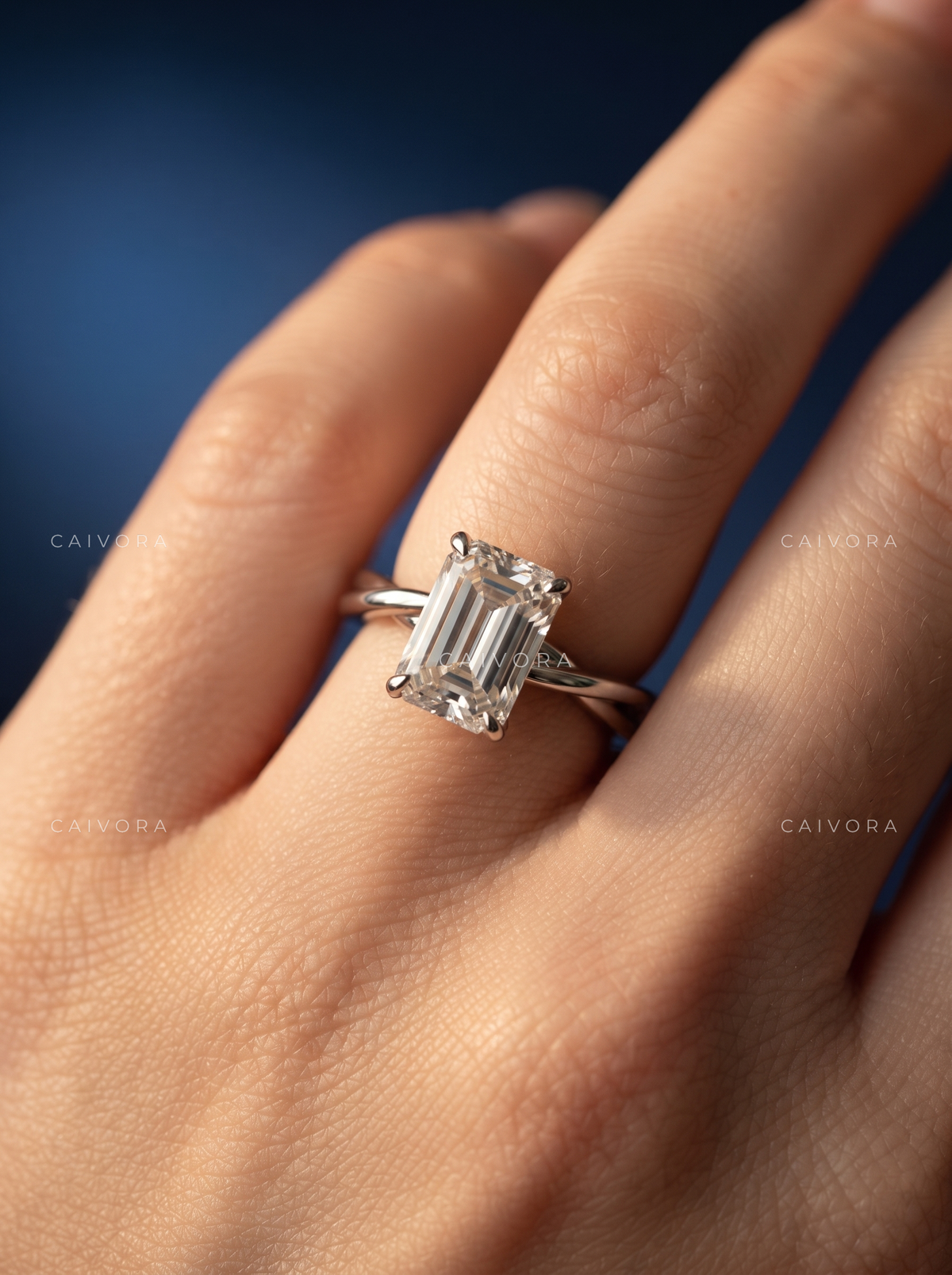 Emerald Cut Engagement Ring with a Refined Hidden Halo