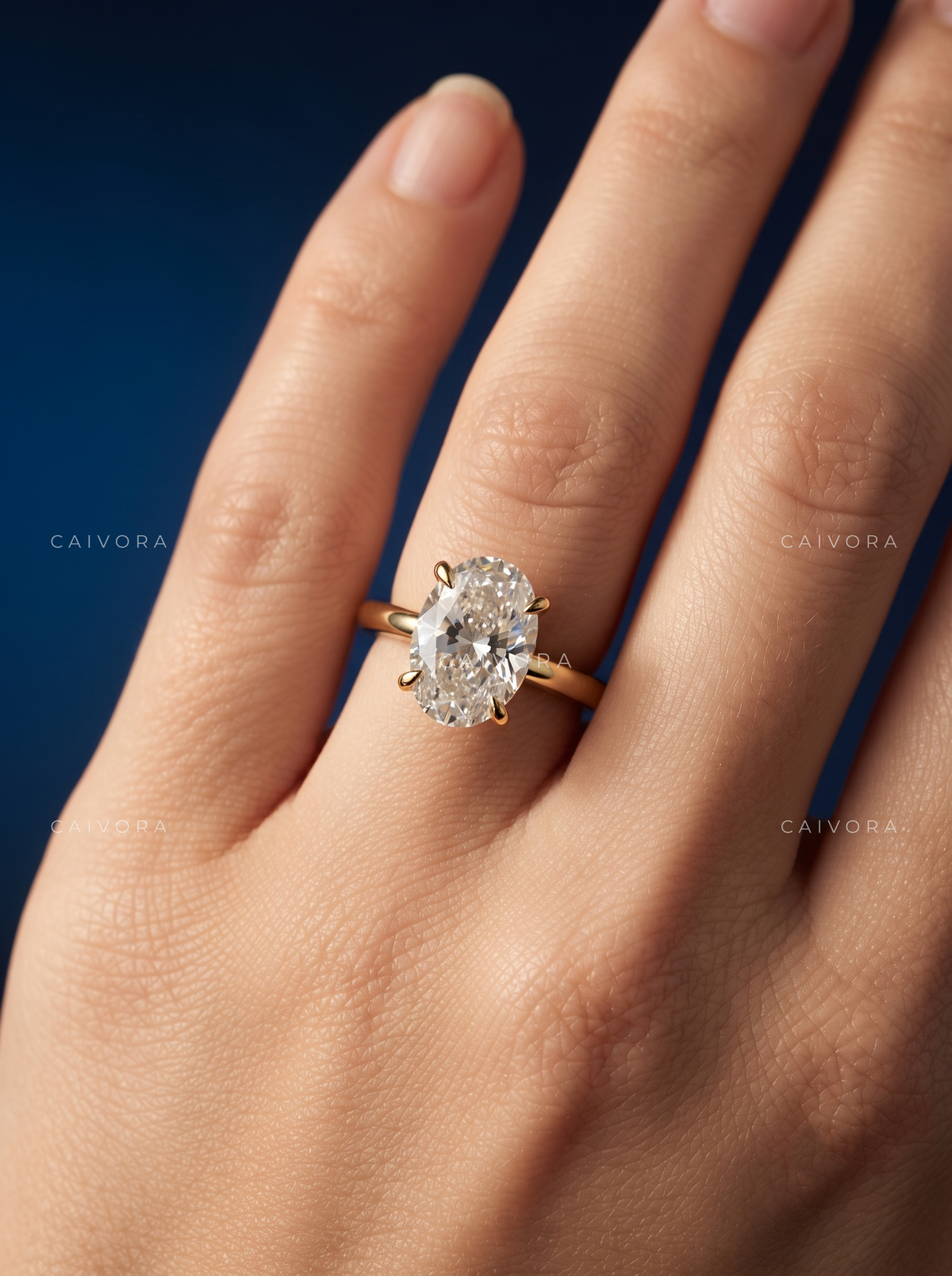 Oval Cut Four Prong Solitaire Engagement Ring