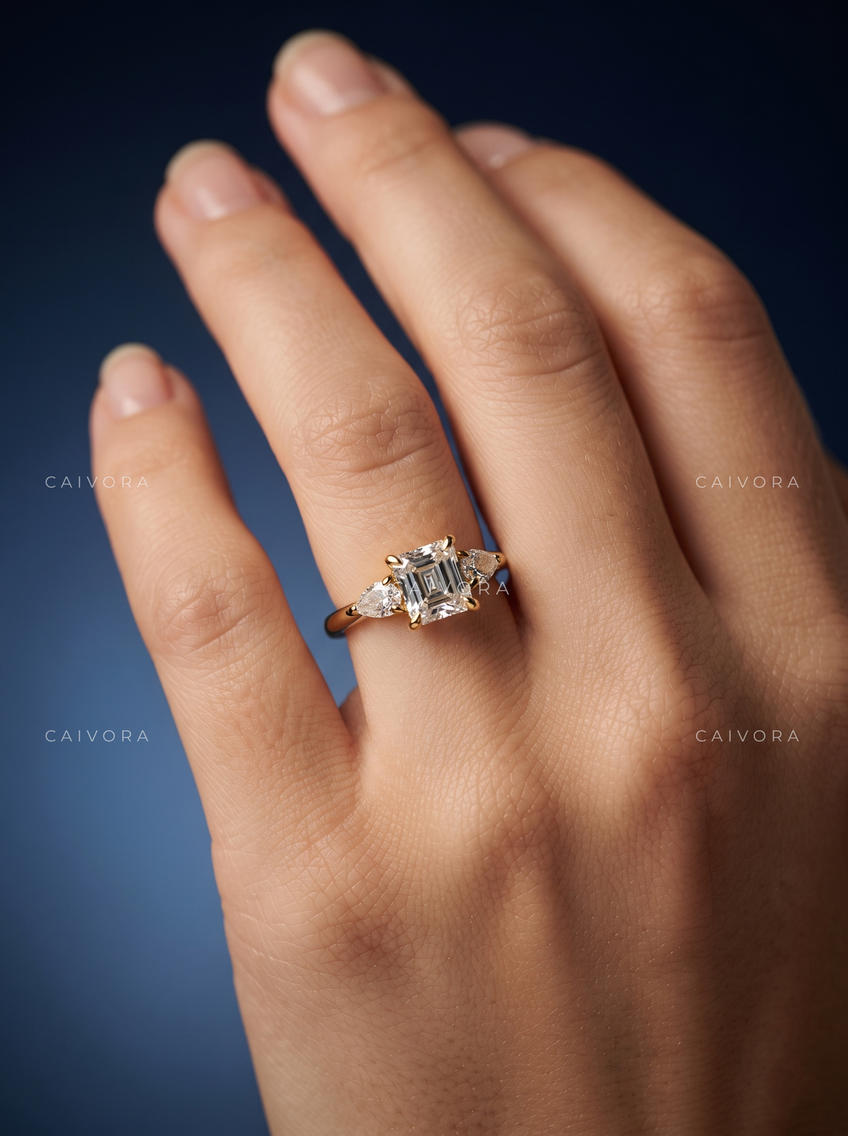 Geometric Three Stone Engagement Ring with an Asscher Cut Center Diamond
