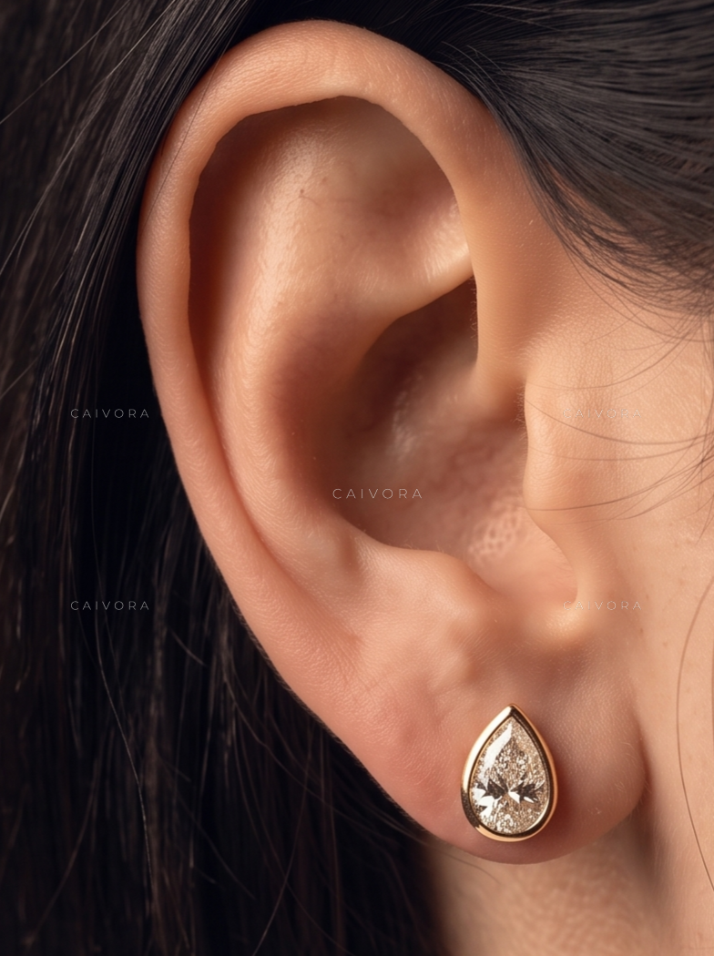 The Serenelle Pear Solitaire Studs