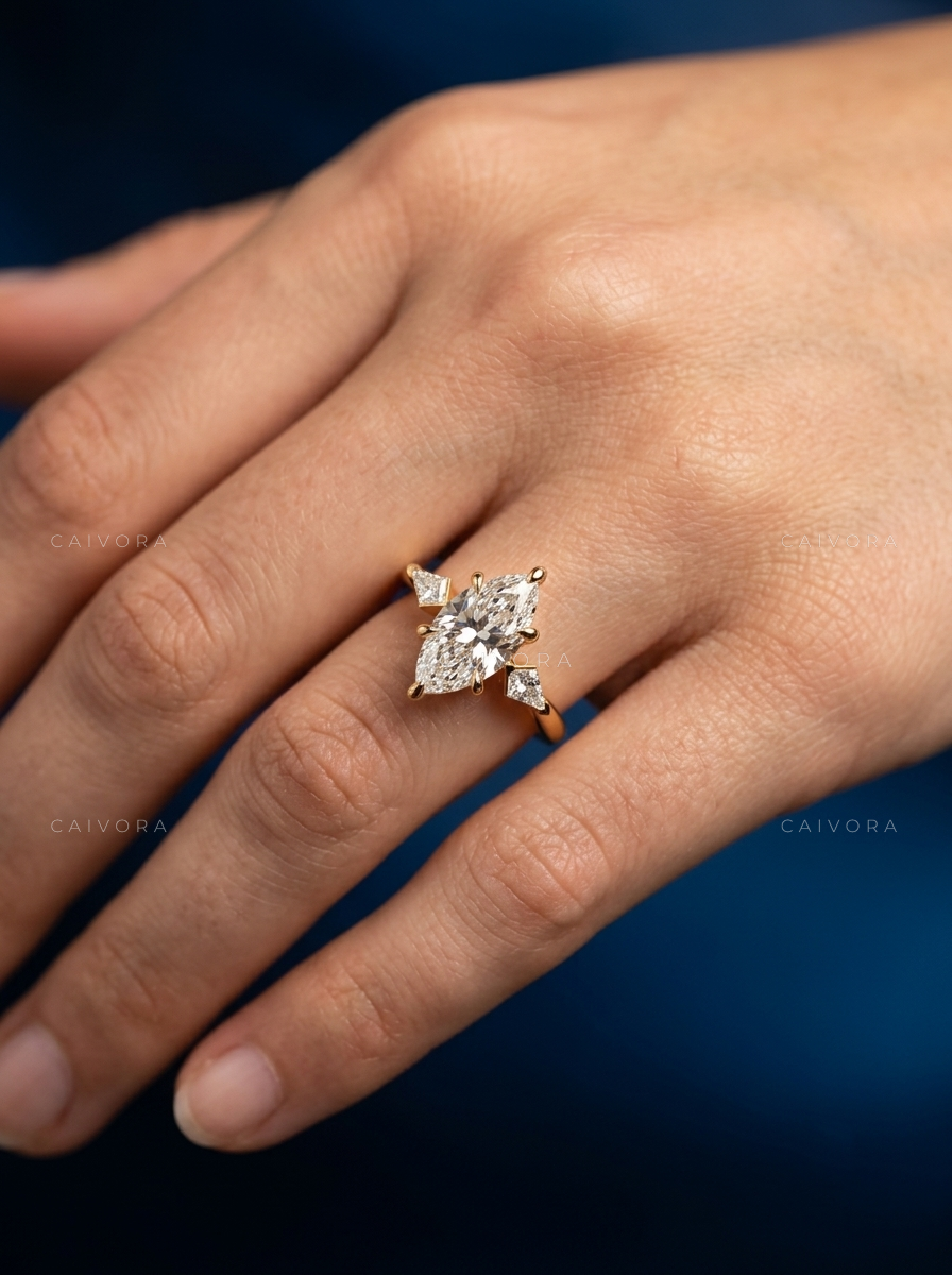 Sophisticated Three Stone Engagement Ring with Marquise Diamond & Kite Accents