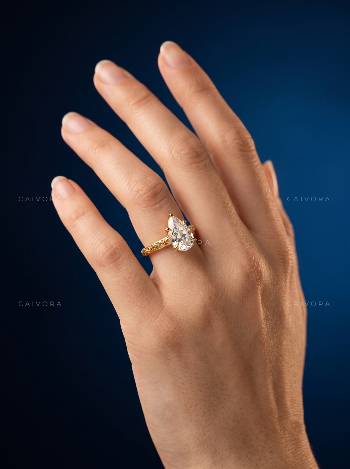 Pear Shaped Diamond Architectural Engagement Ring with Round Accents