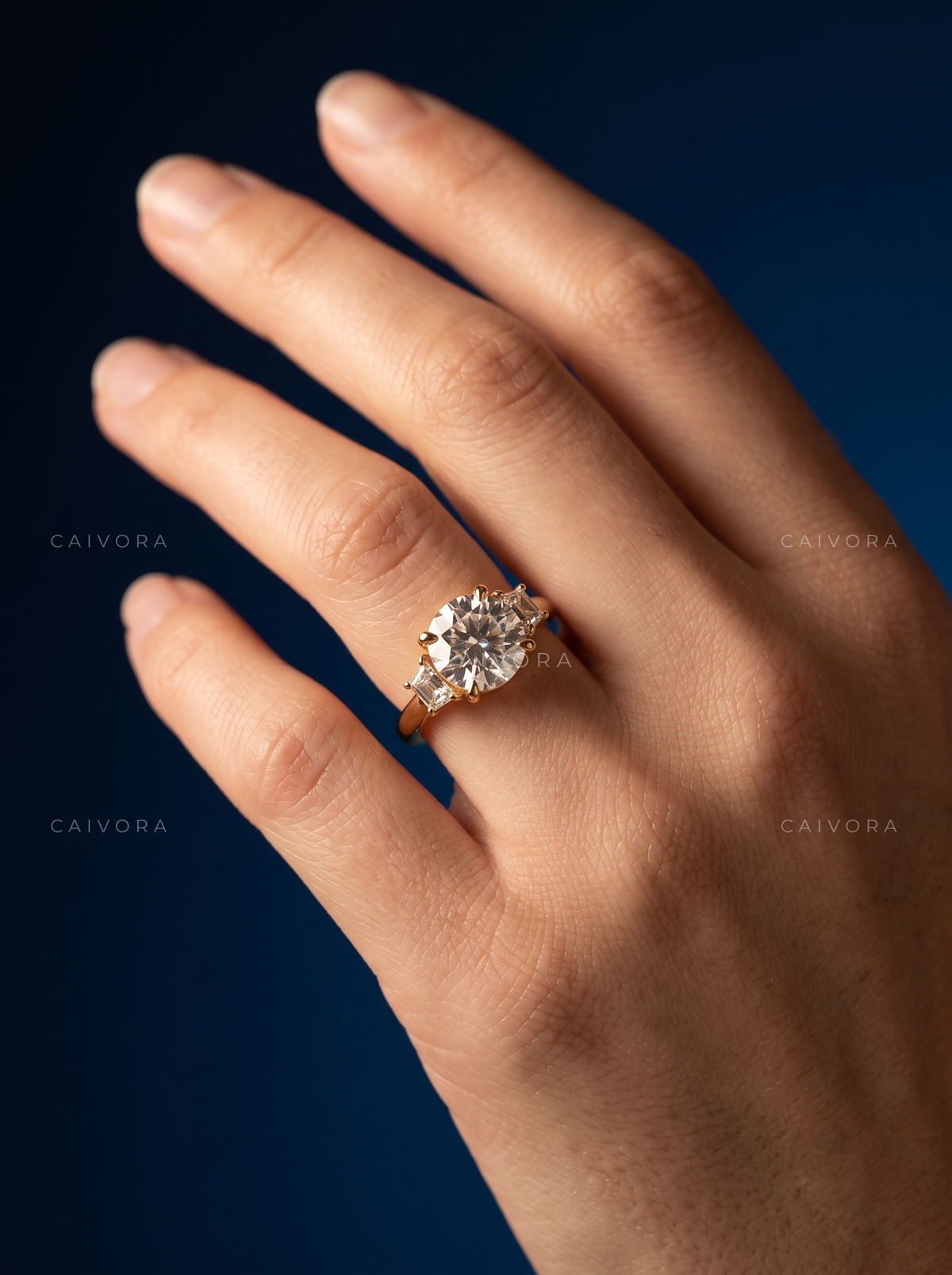 Classic Three Stone Engagement Ring with Round Diamond & Trapezoid Accents