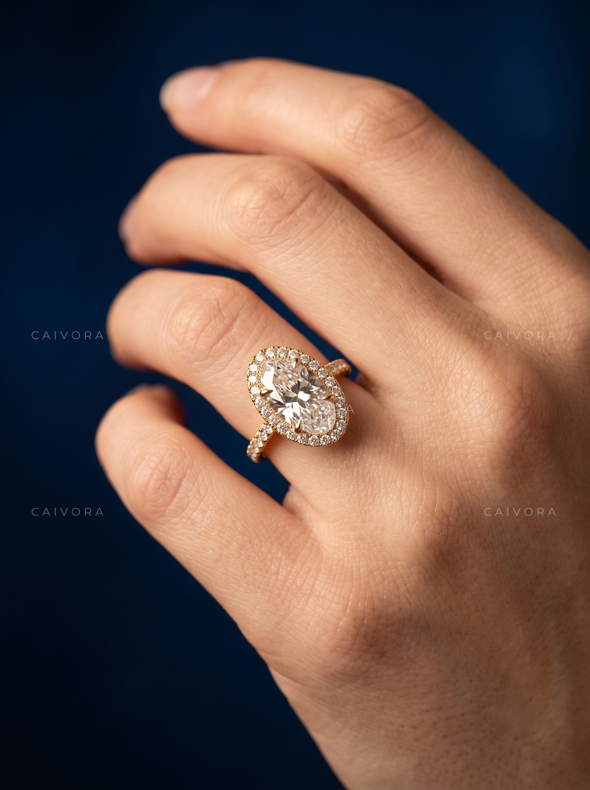 Elegant Moval Diamond Halo Engagement Ring with Pavé Accents