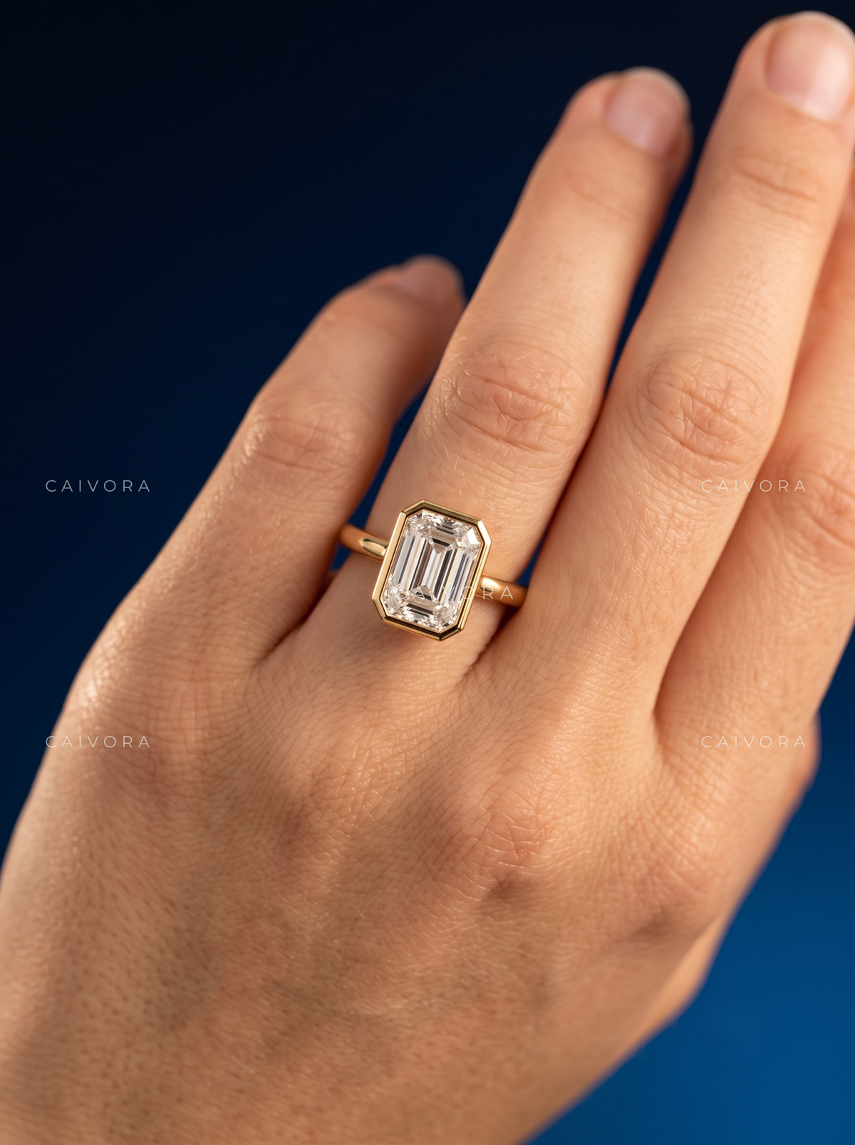 Sleek Sophistication with an Emerald Cut Hidden Halo