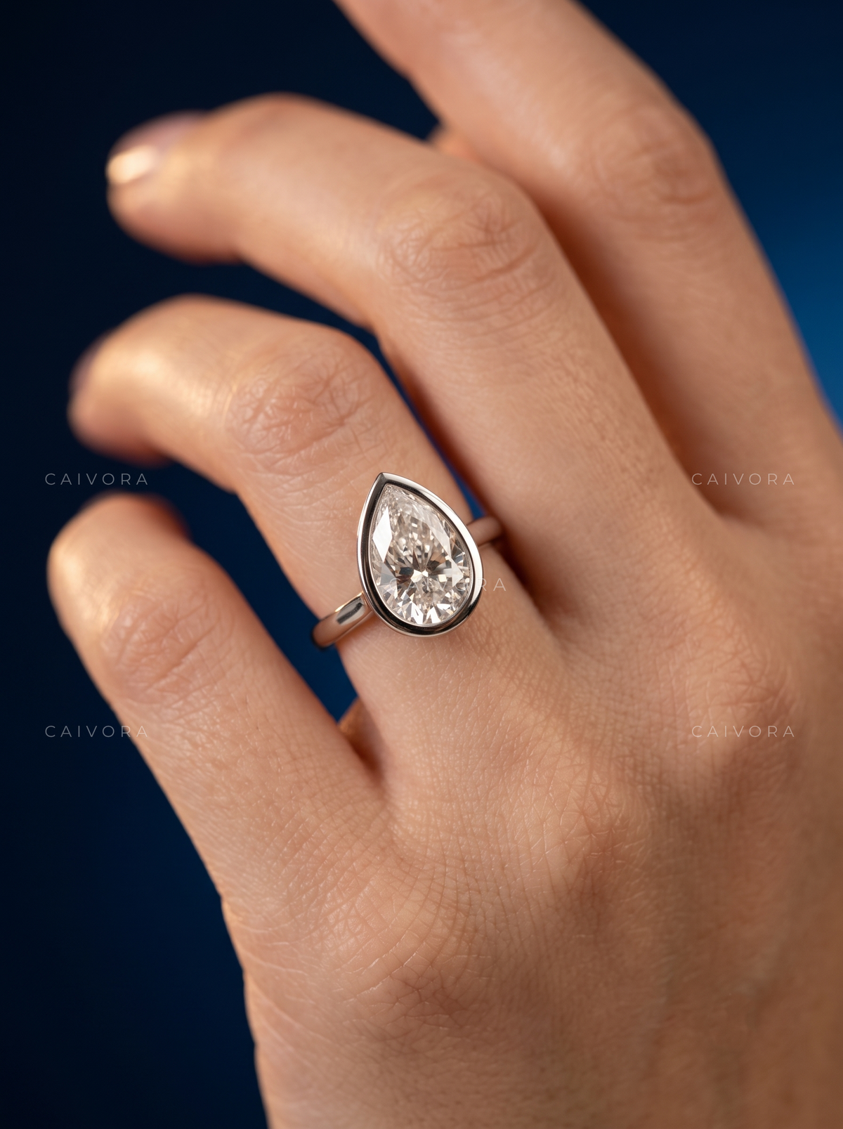 Pear Shaped Bezel Set Engagement Ring