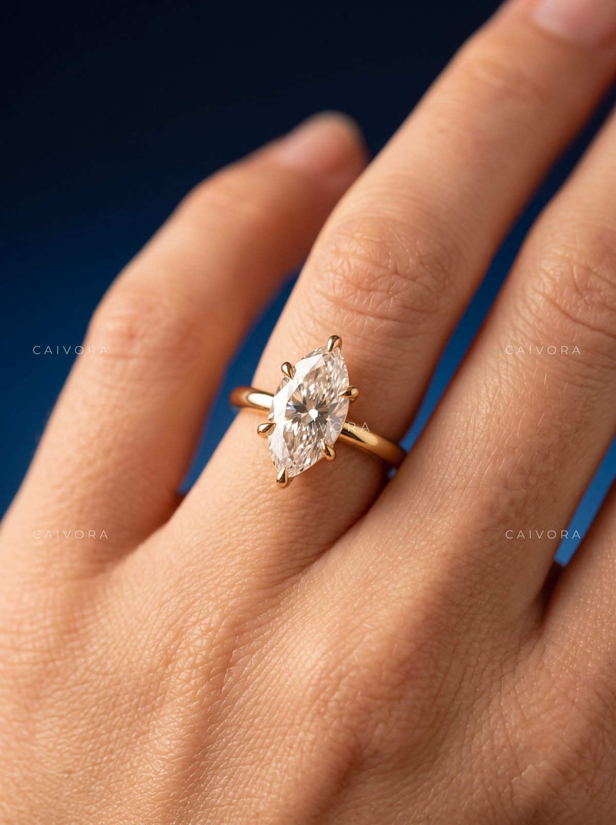 Marquise Cut Four Prong Solitaire Engagement Ring