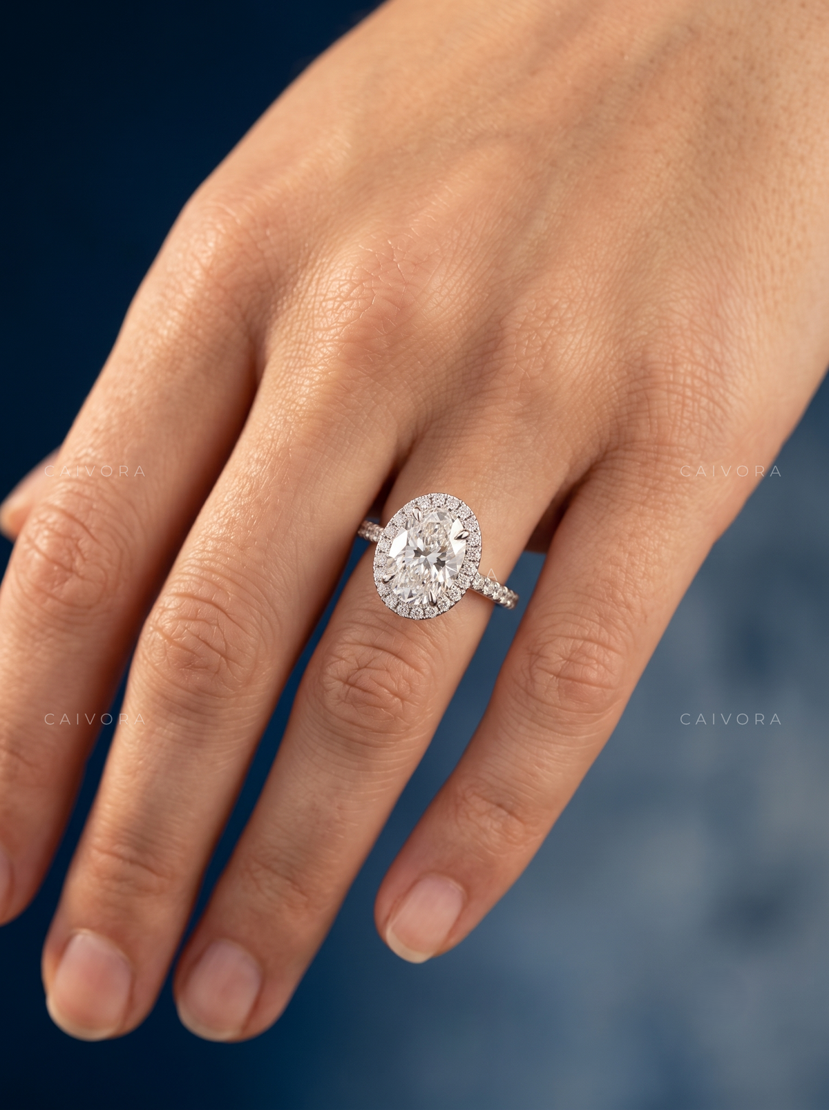 Elegant Halo Engagement Ring with Oval Diamond & Pavé Accents