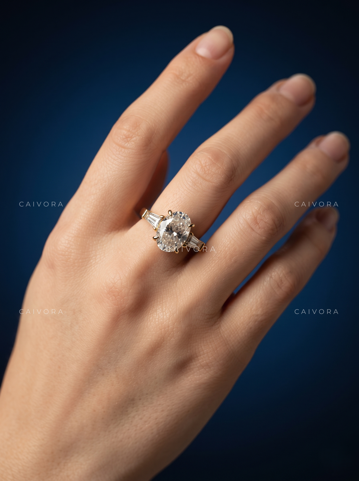 Elongated Brilliance in an Oval Cut Three Stone Setting