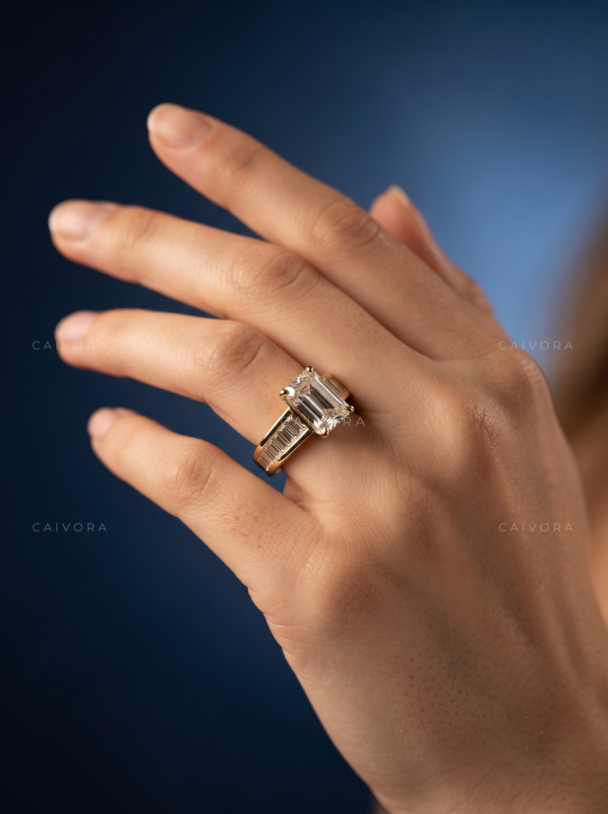 Emerald Cut Channel Setting Engagement Ring with Baguette Accents