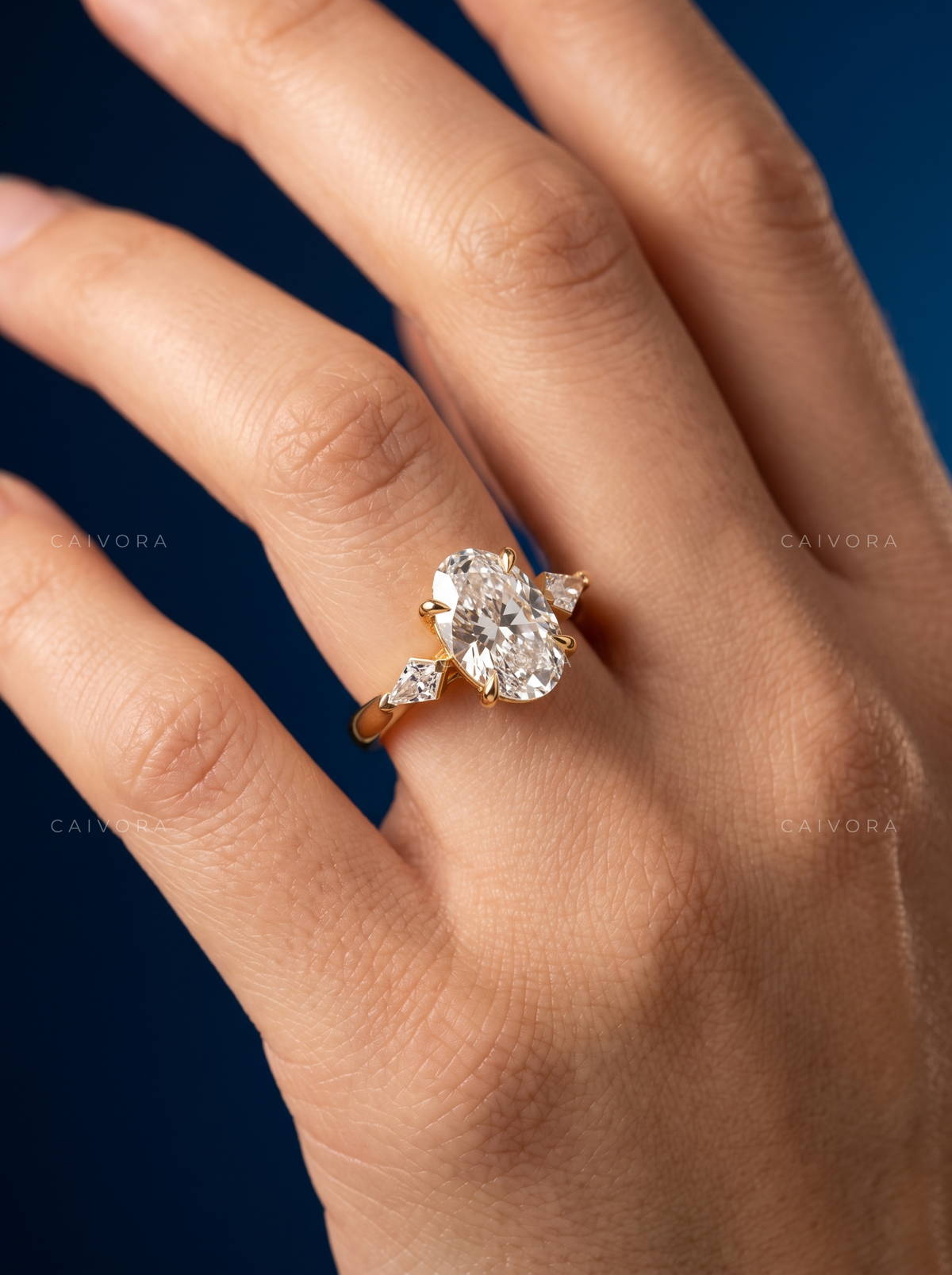 Classic Three Stone Engagement Ring with Oval Diamond & Kite Accents