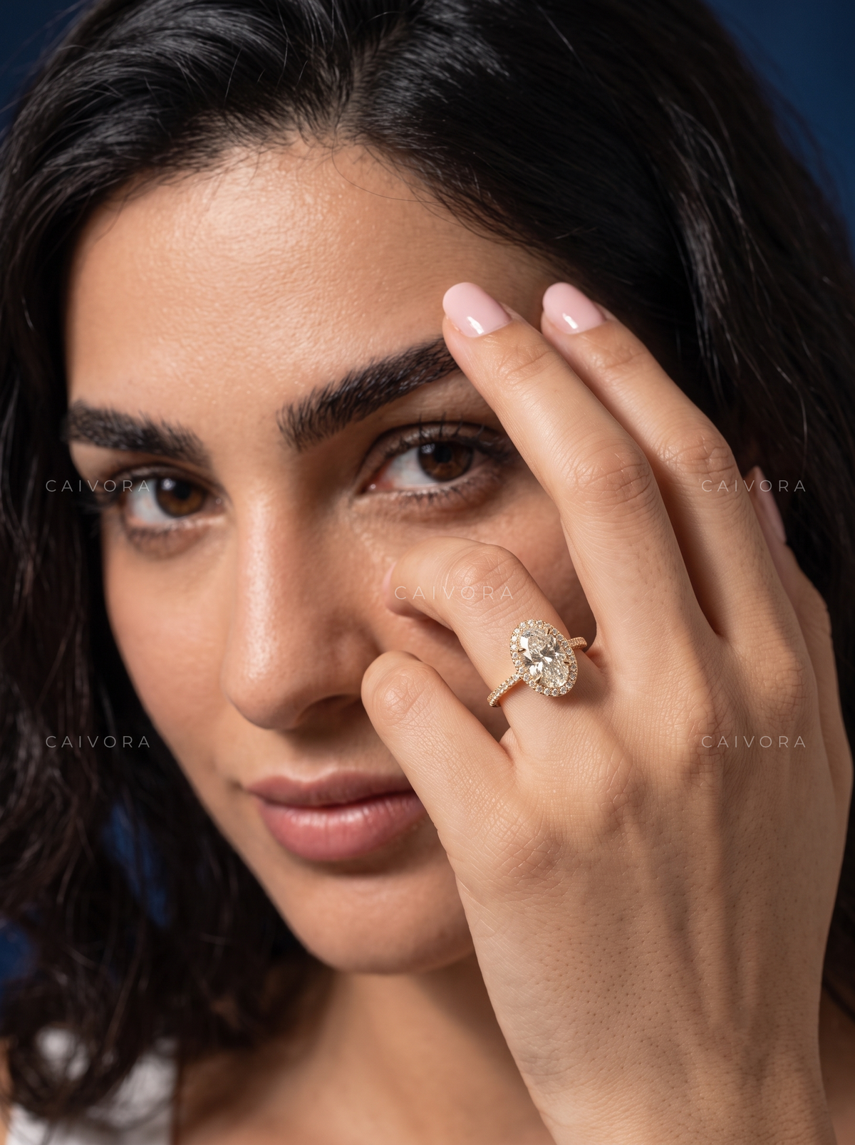 Elegant Moval Diamond Halo Engagement Ring with Pavé Accents