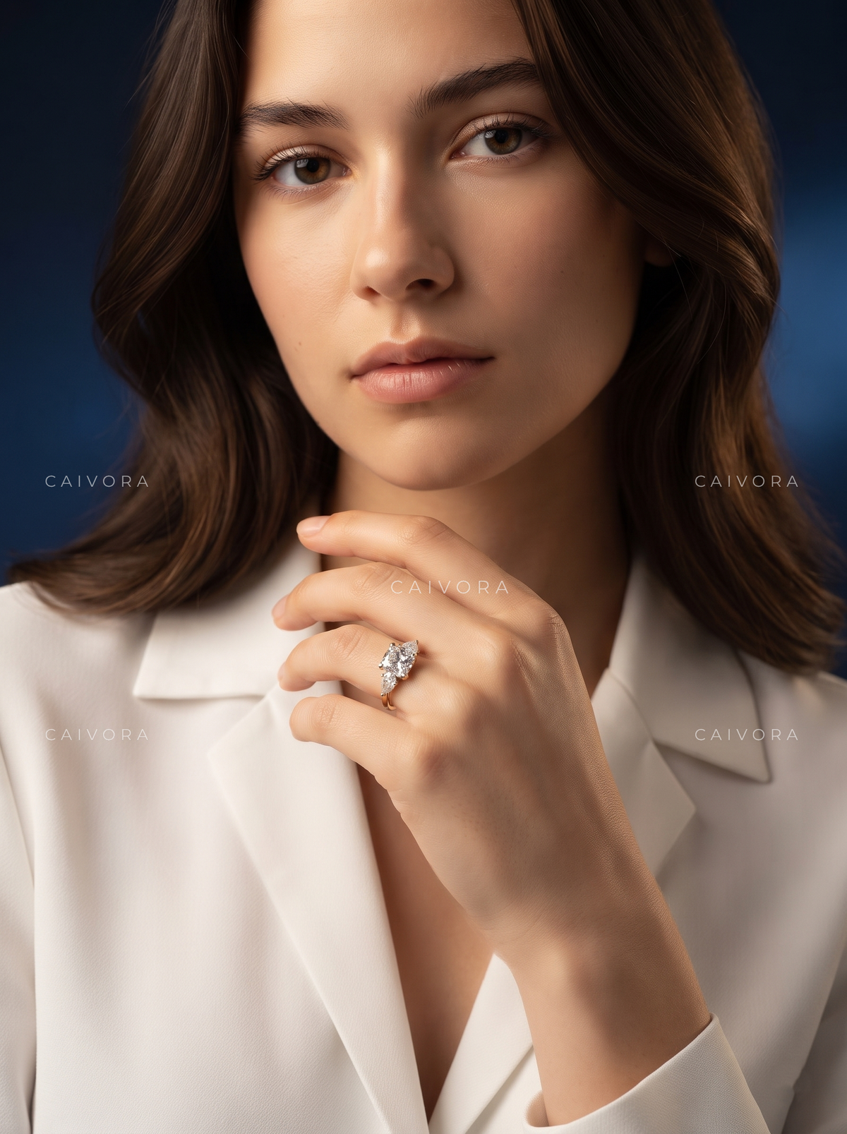 Graceful Three Stone Diamond Ring Featuring a Cushion Cut Center