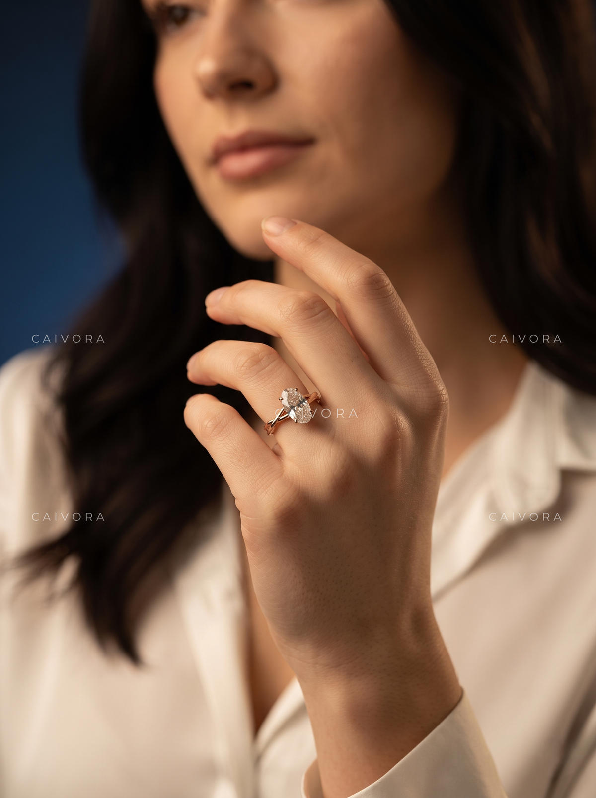 Graceful Sophistication with a Moval Cut Center Diamond