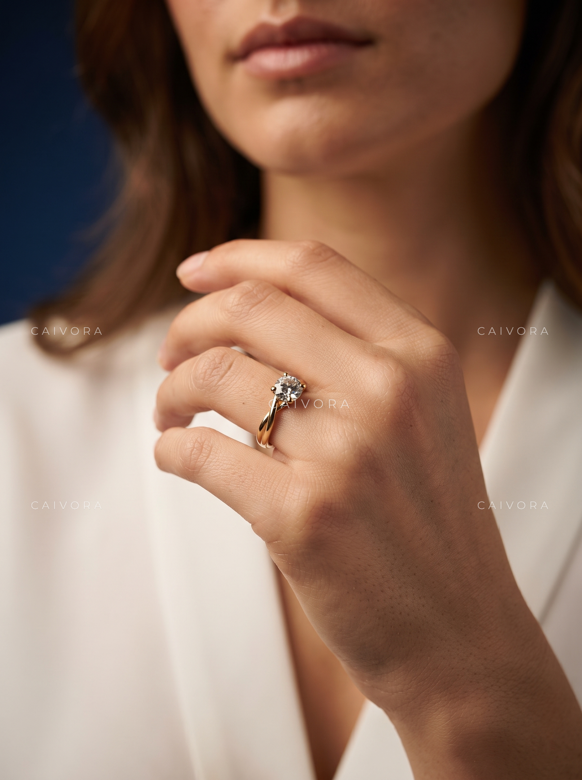 Round Cut Engagement Ring with a Hidden Halo and Solitaire Setting