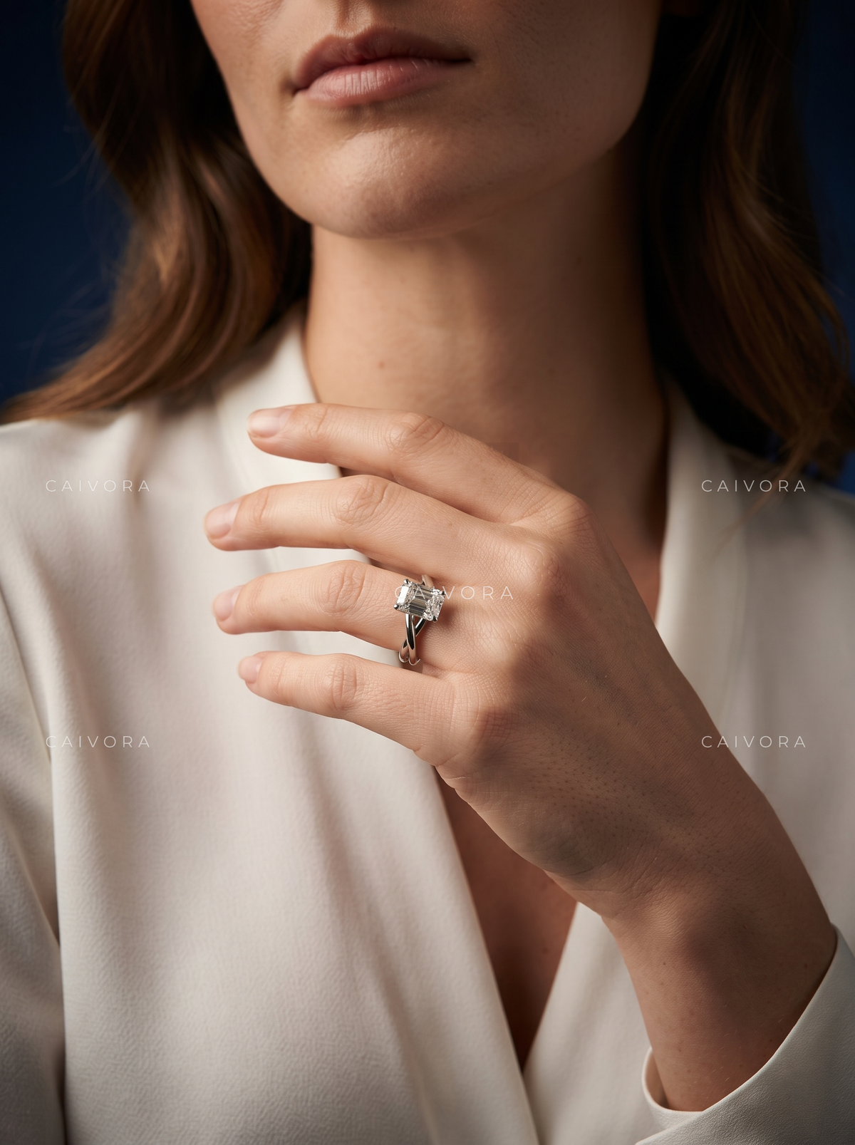 Emerald Cut Engagement Ring with a Refined Hidden Halo