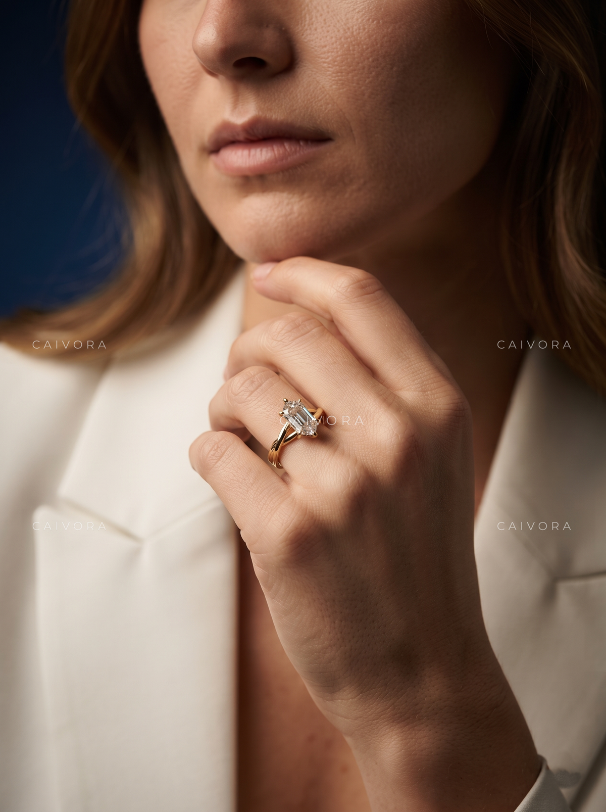 Modern Sophistication with an Elongated Hexagon Step Cut Center
