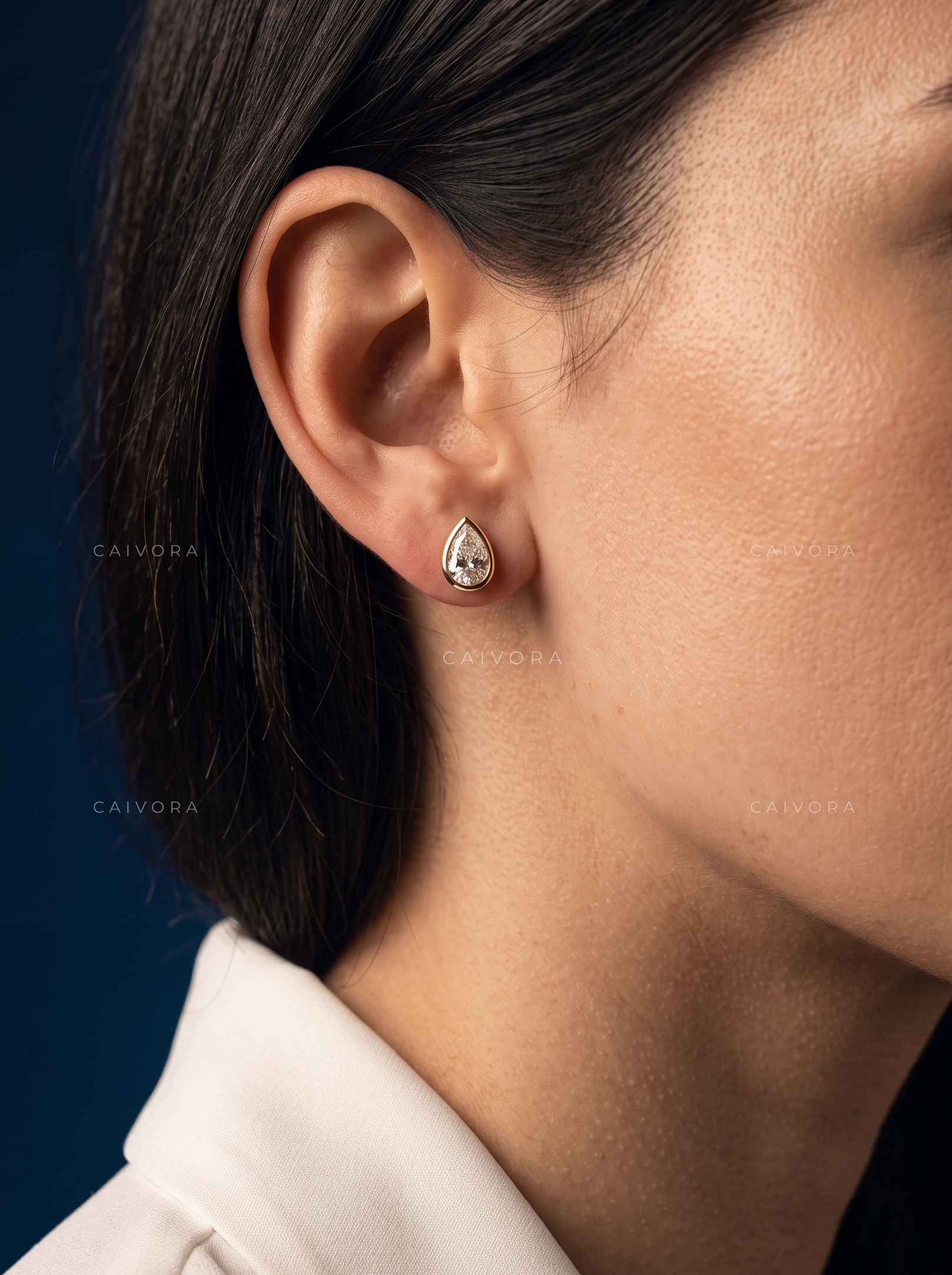 The Serenelle Pear Solitaire Studs