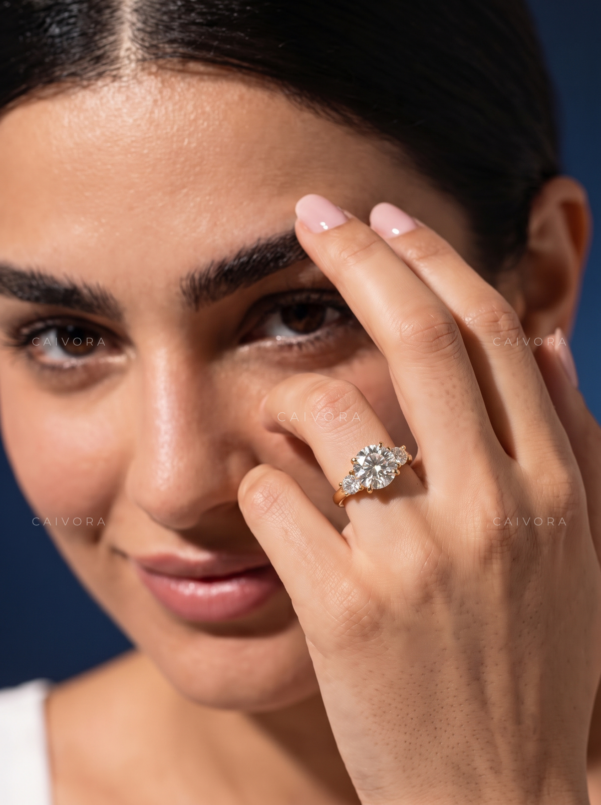 Classic Three Stone Engagement Ring with Round Diamond & Trapezoid Accents