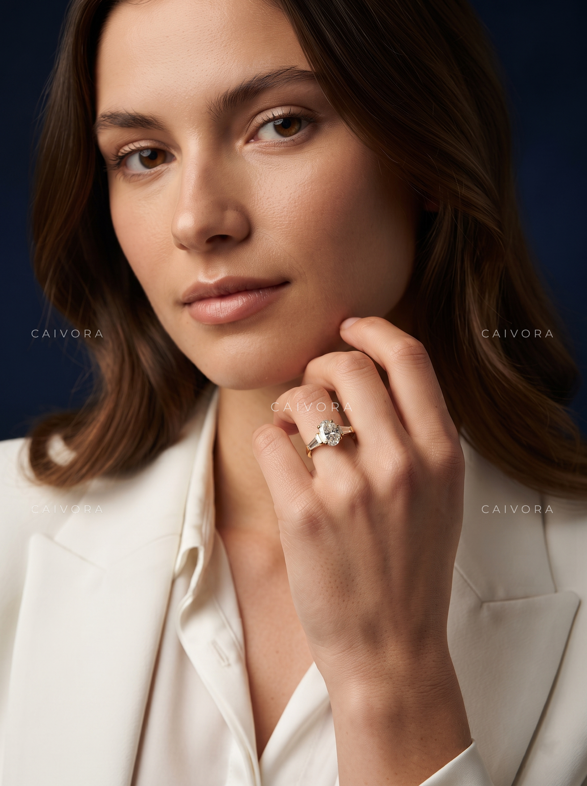 Elongated Brilliance in an Oval Cut Three Stone Setting