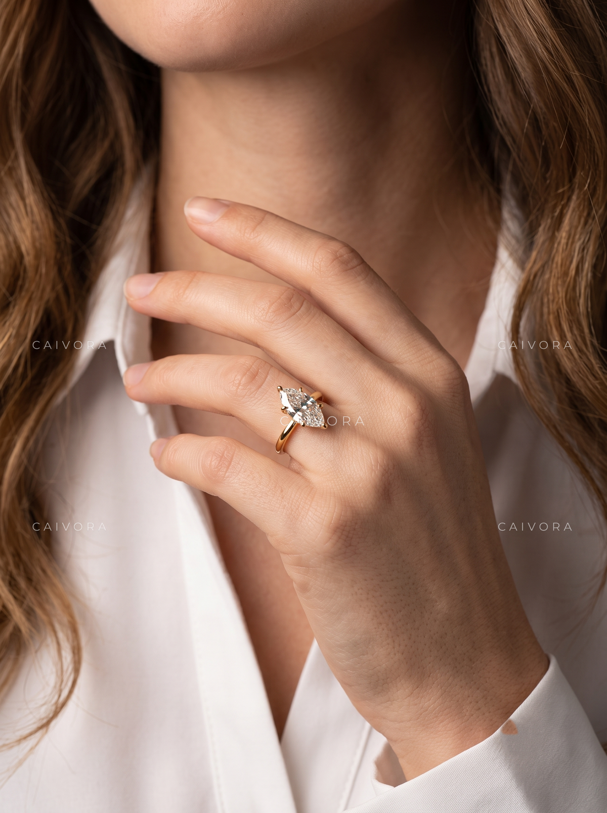 Marquise Cut Four Prong Solitaire Engagement Ring
