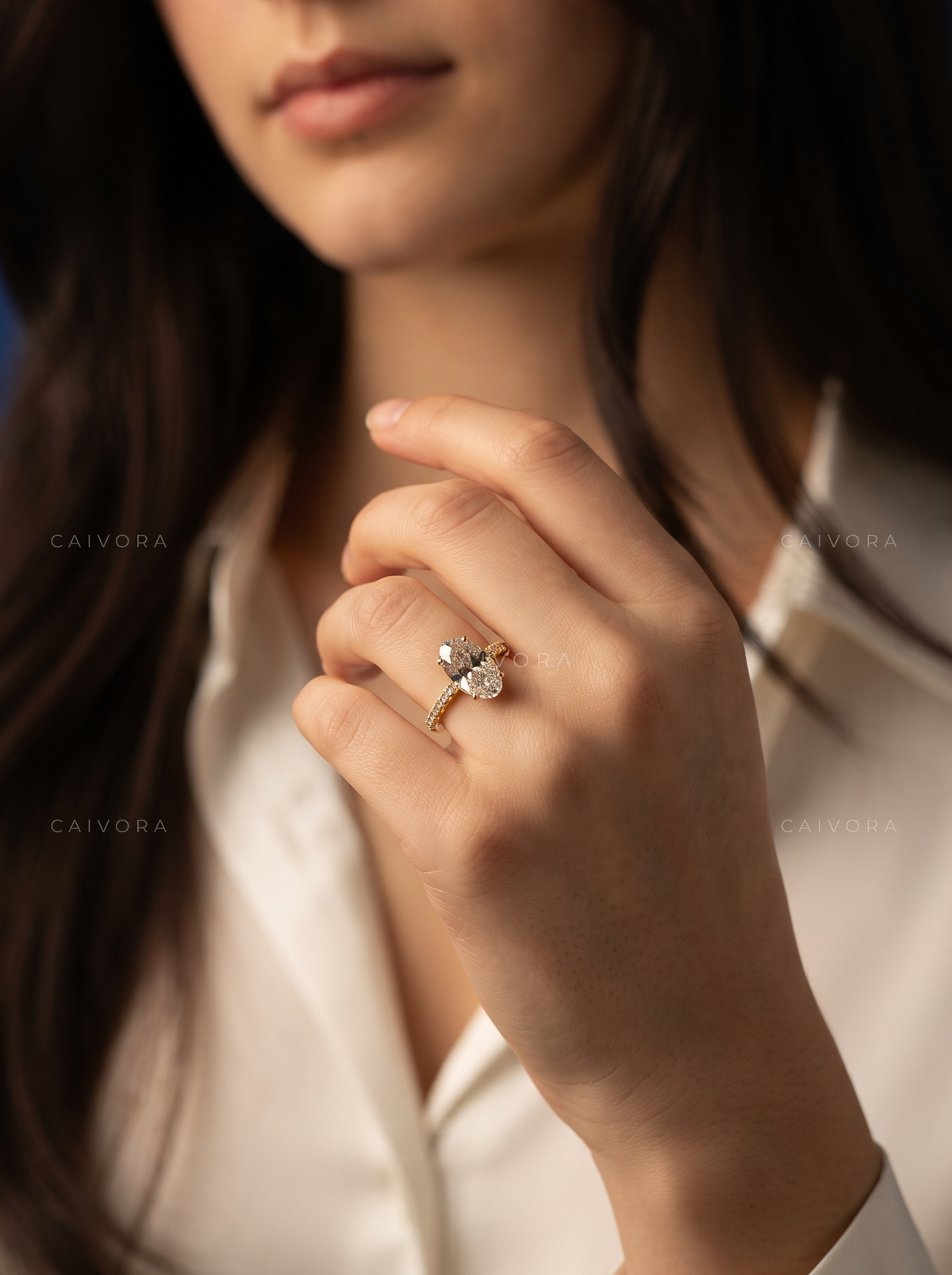 Moval Cut Diamond Engagement Ring with Brilliant Pave Accents