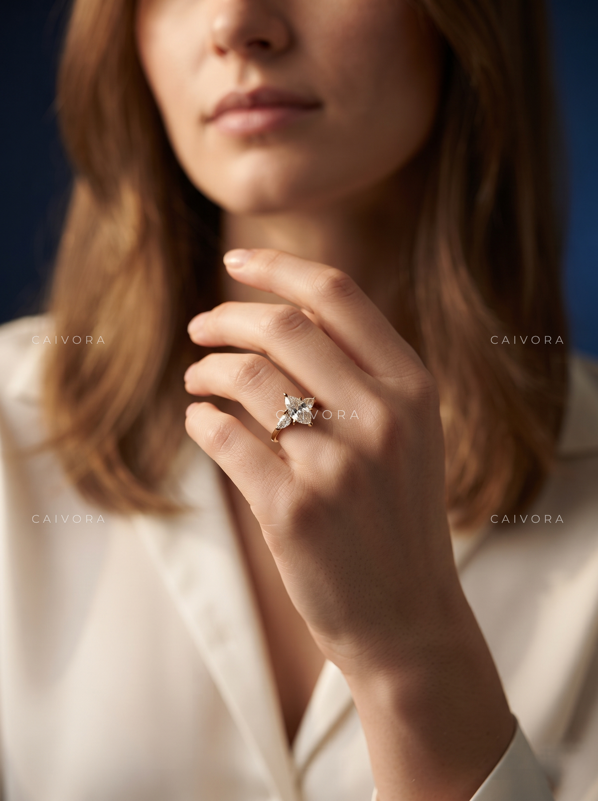 Elegant Three Stone Engagement Ring Centered on a dutch marquise Cut Diamond