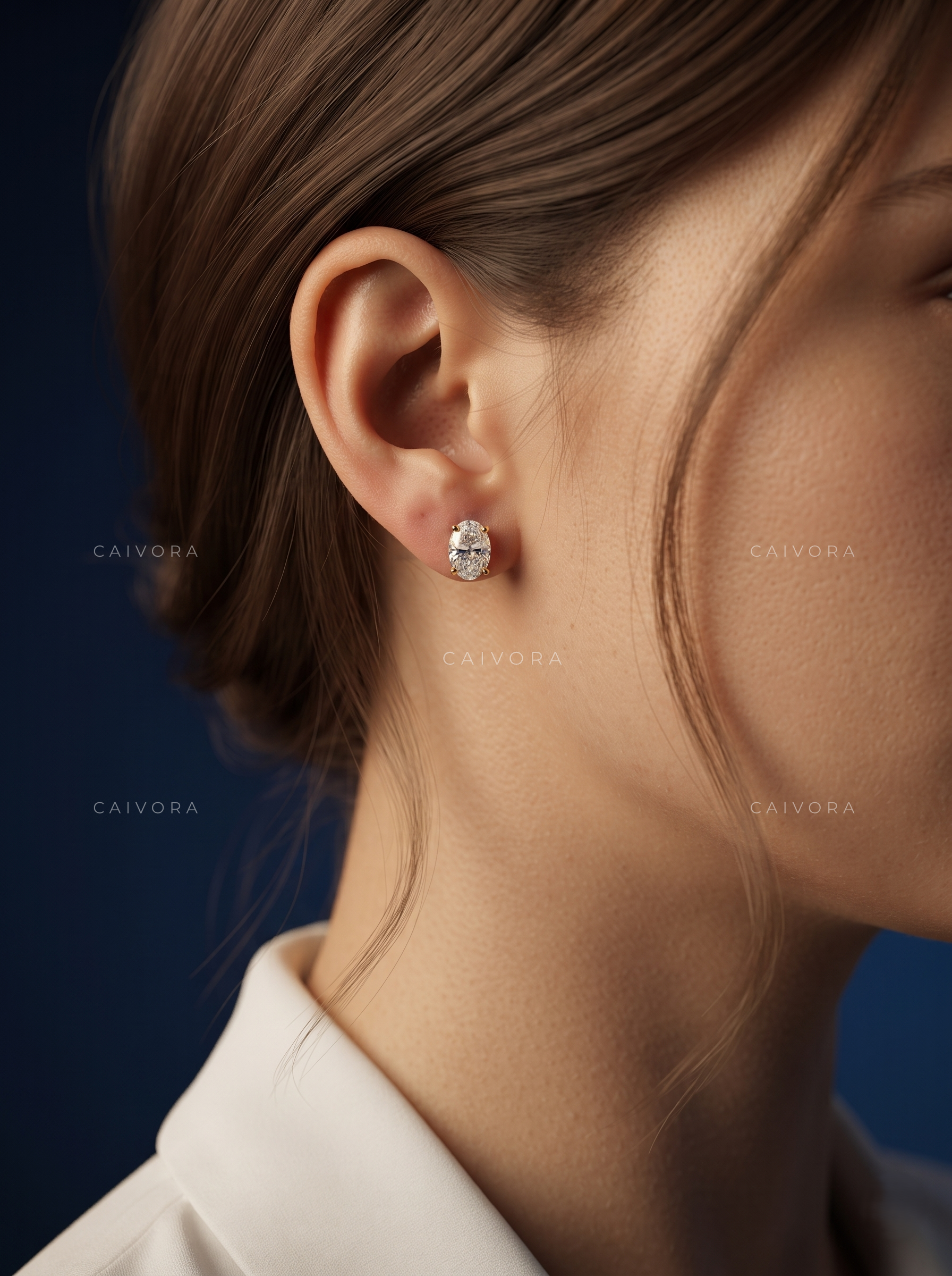 Prism Radiance Four-Prong Oval Solitaire Stud Earrings