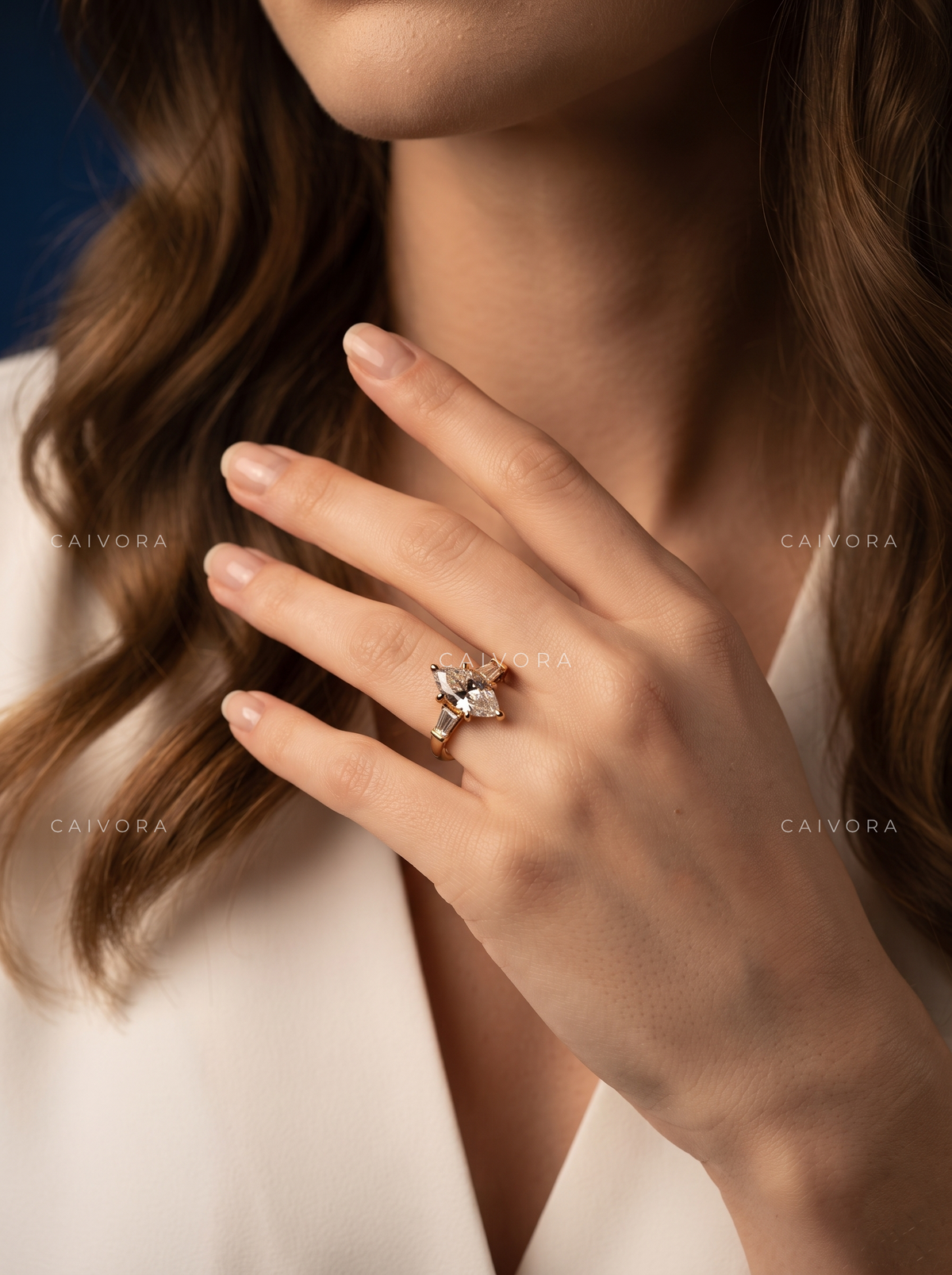 Sculpted Elegance with a Marquise Cut Center Diamond