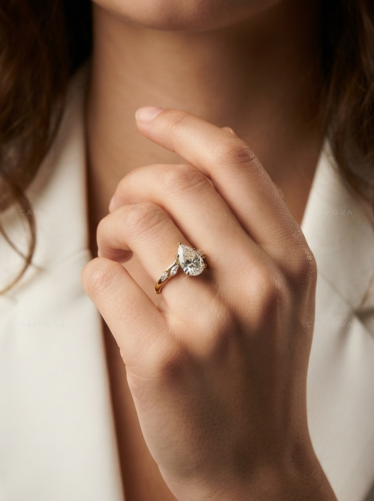 Pear Cut Diamond Engagement Ring with Sculpted Twist Band