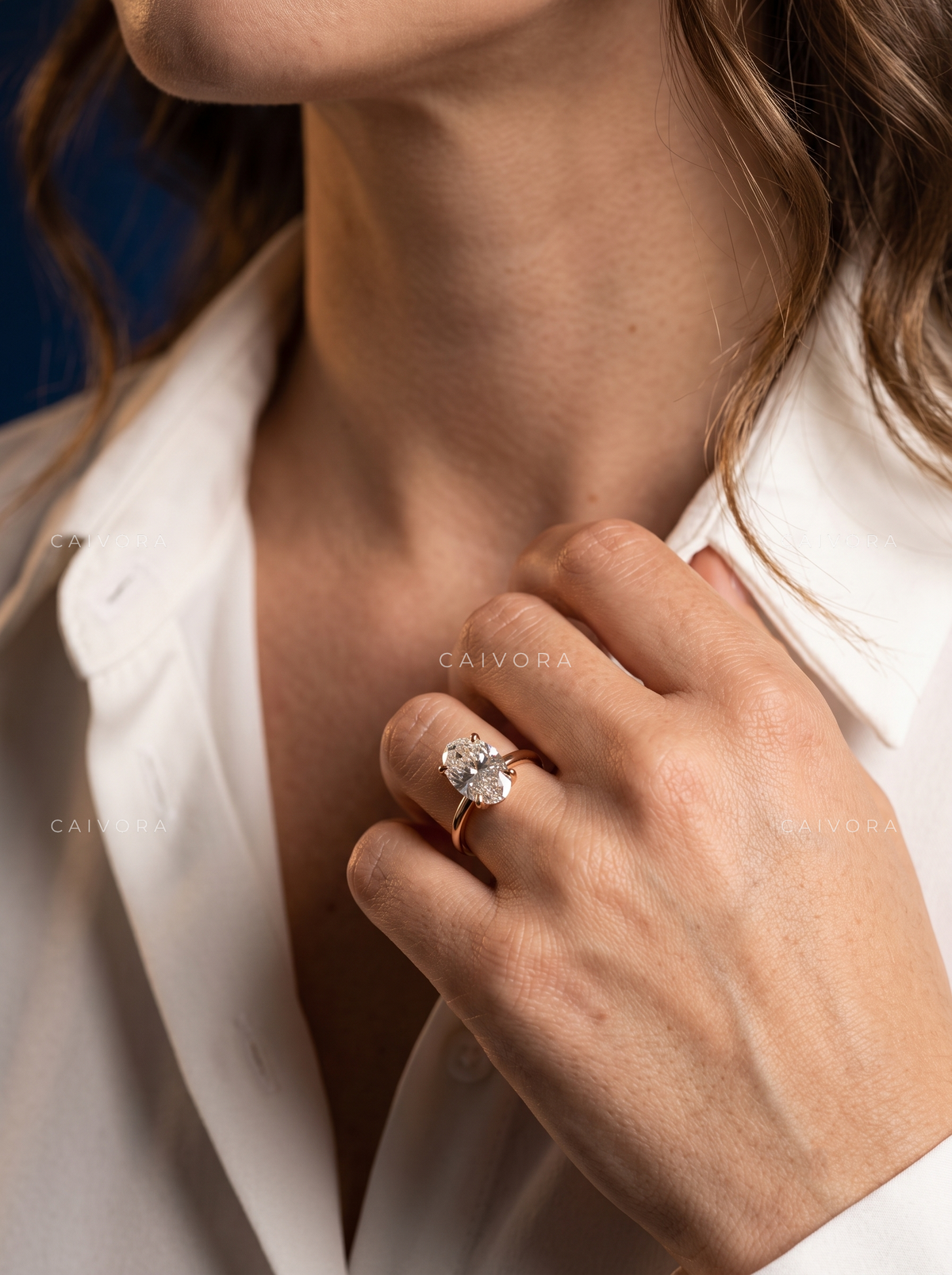 Moval Cut Four Prong Solitaire Engagement Ring