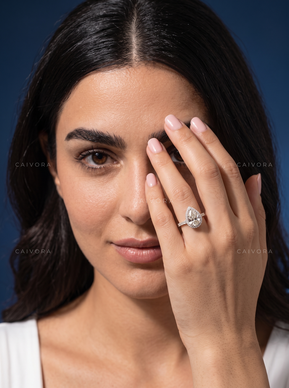 Elegant Halo Engagement Ring with Pear Diamond & Pavé Accents