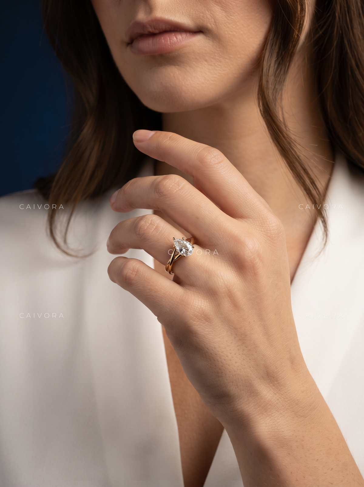 Petal Radiance Kosina Engagement Ring with a Pear Cut Diamond