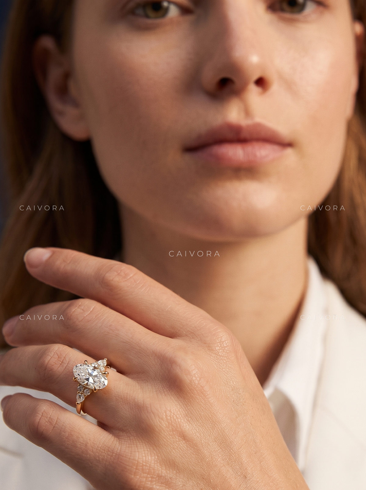 Latin-Inspired Diamond Engagement Ring with an Moval Center Stone