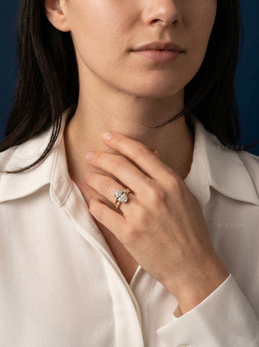 Graceful Twist Band Engagement Ring with an Moval Cut Center Stone