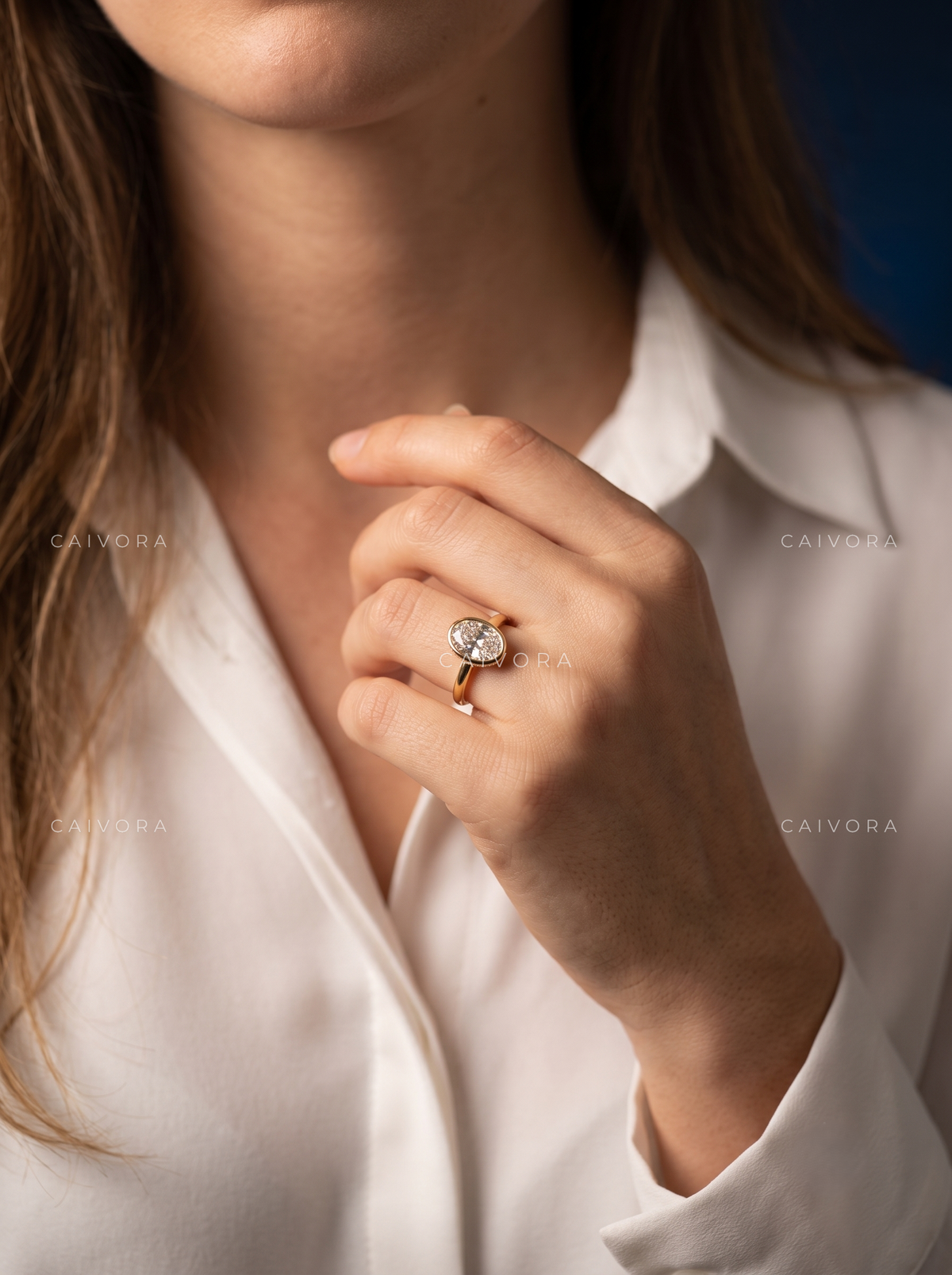 Fluid Elegance with an Oval Cut Hidden Halo