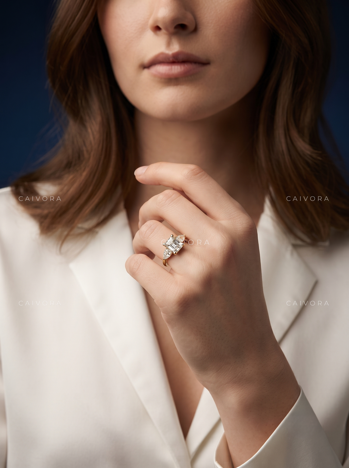 Geometric Three Stone Engagement Ring with an Asscher Cut Center Diamond