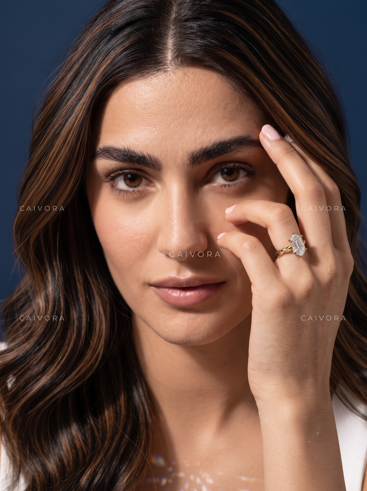 Modern Sophistication with an Elongated Hexagon Step Cut Center