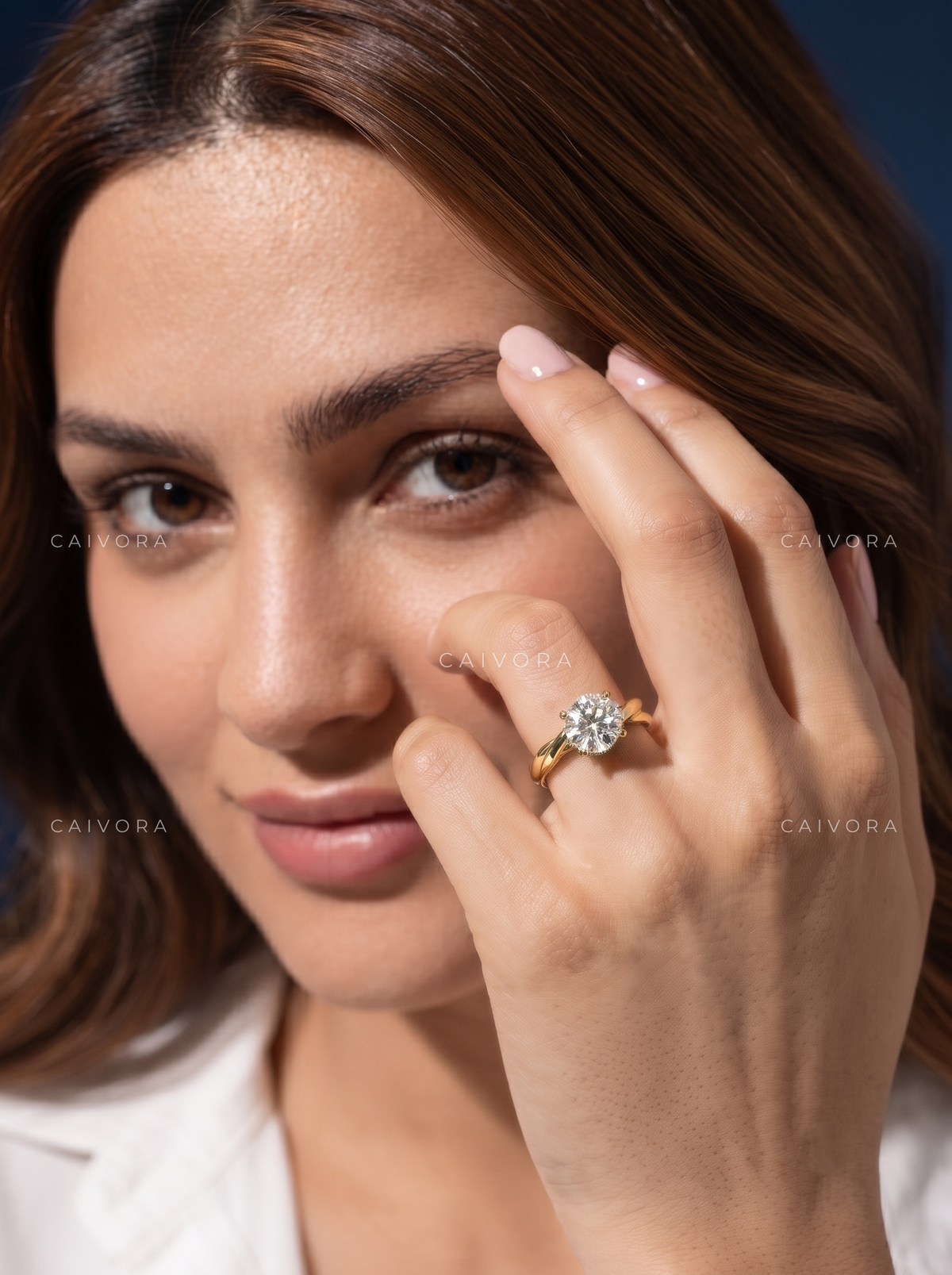 Round Cut Engagement Ring with a Hidden Halo and Solitaire Setting