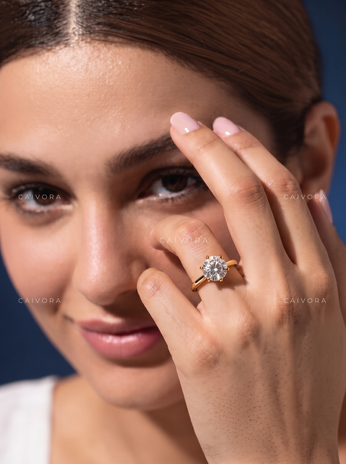 Classic Tapered Cathedral Engagement Ring Centered on a Round Cut Diamond
