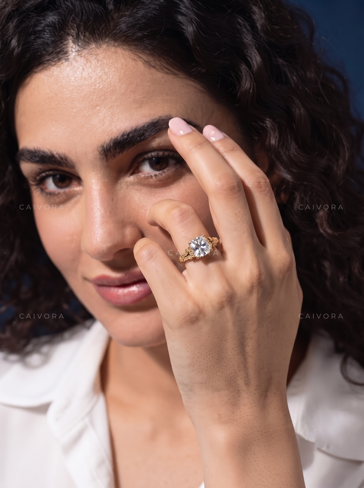 Amara Sculpted Diamond Ring Featuring a Cushion Cut Center