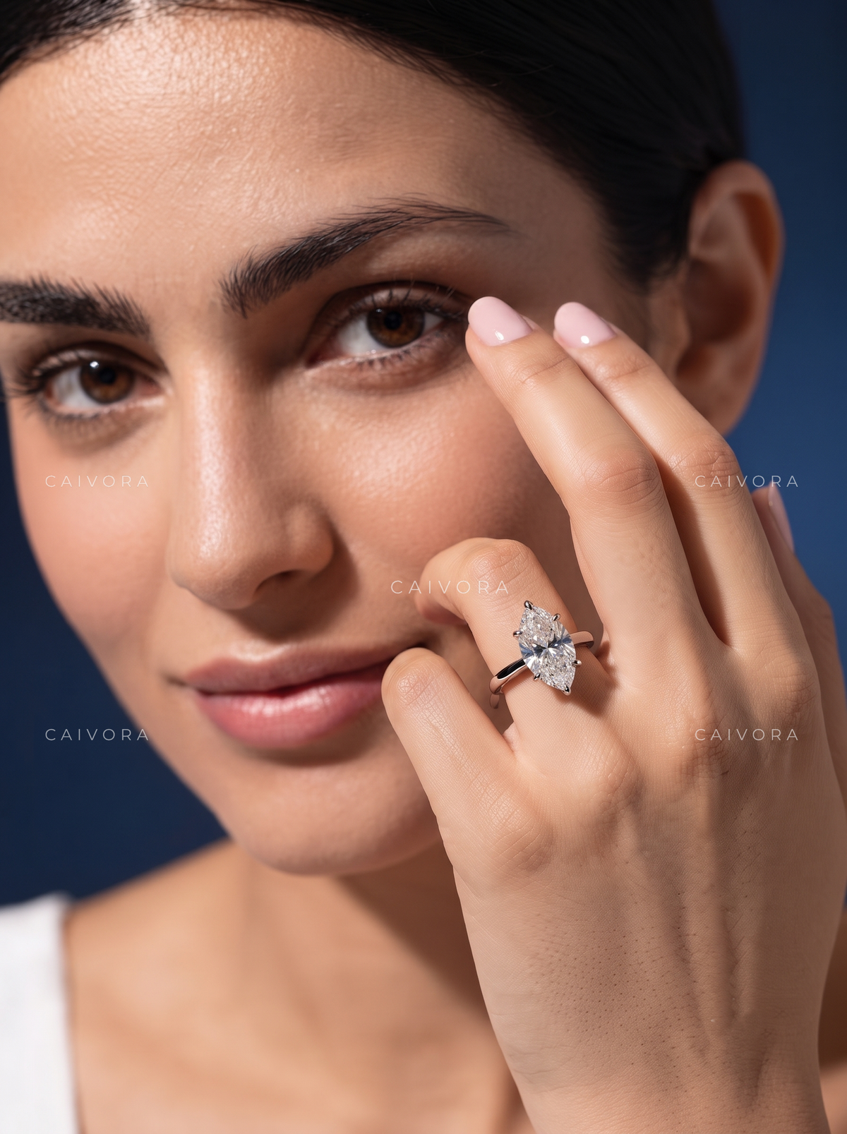Distinctive Tapered Cathedral Engagement Ring with a Marquise Cut Diamond