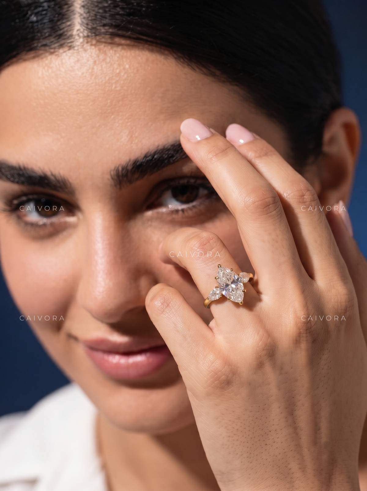 Elegant Three Stone Engagement Ring Centered on a dutch marquise Cut Diamond