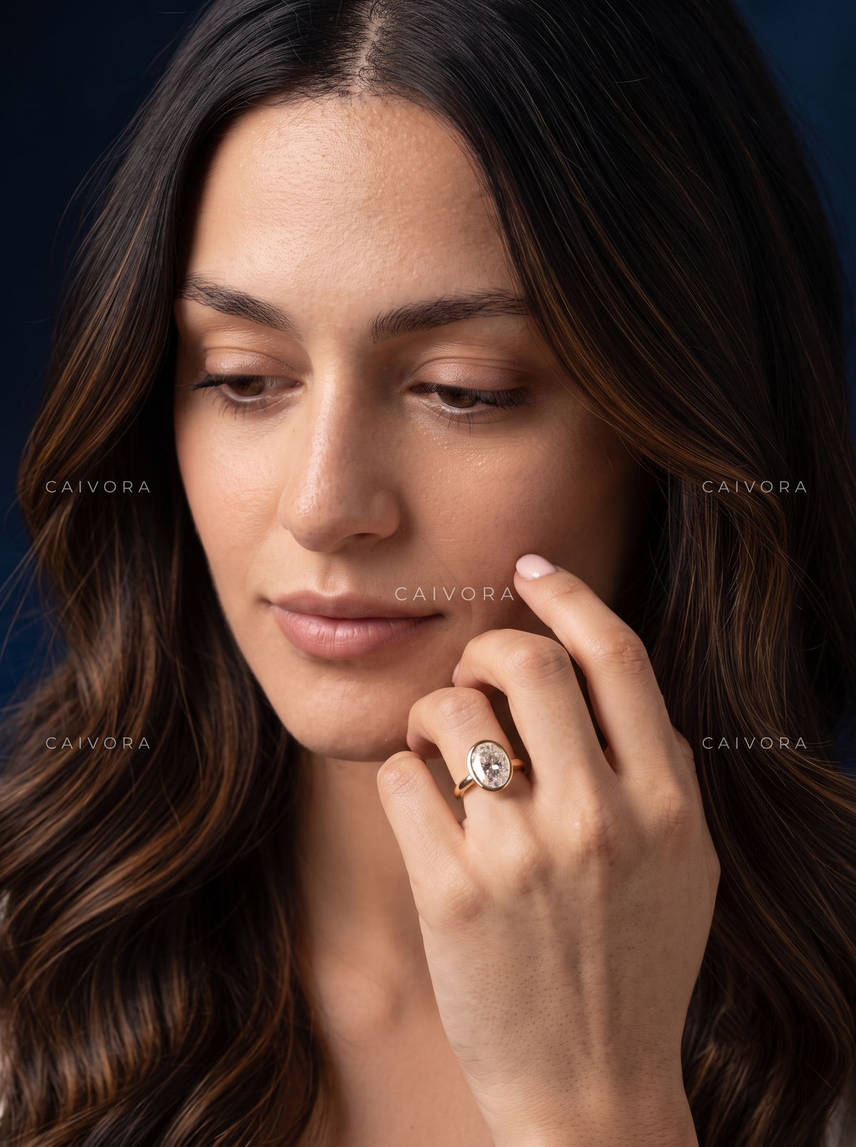 Fluid Elegance with an Oval Cut Hidden Halo