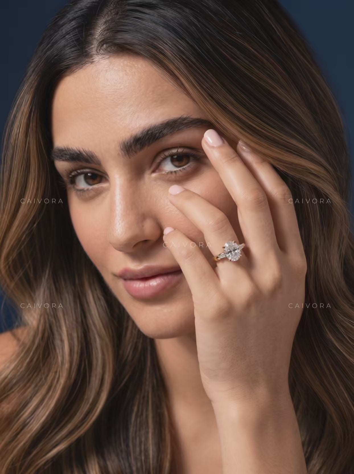 Elongated Brilliance in an Oval Cut Three Stone Setting